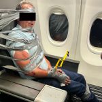 Aggressiver Passagier auf American Airlines-Flug: Festnahme nach gewalttätigem Vorfall